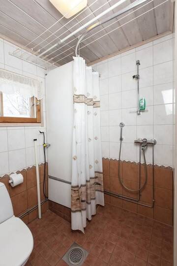 Фото номера Коттедж с 2 спальнями и сауной Шале Koli Freetime Cottages г. Ахмоваара 8