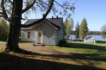 Фото номера Коттедж с 2 спальнями и сауной Шале Koli Freetime Cottages г. Ахмоваара 17